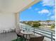 Private balcony with water views and seating at 1709 N Tamiami Trl # A421, Sarasota, FL 34234