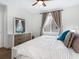 Spacious bedroom with comfortable bed and large windows at 1709 N Tamiami Trl # A421, Sarasota, FL 34234