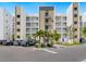 Modern building exterior with parking and landscaping at 1709 N Tamiami Trl # A421, Sarasota, FL 34234