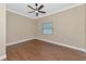 Spacious bedroom with wood flooring and ceiling fan at 1712 6Th E Ave, Bradenton, FL 34208