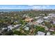 Aerial view of a neighborhood with waterfront and city skyline in the background at 1805 Datura St, Sarasota, FL 34239