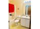 Clean bathroom with a tub, toilet, and vanity at 2306 6Th Avenue E Dr, Bradenton, FL 34208