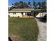 Cute ranch home with carport and well-maintained lawn at 2715 Nancy St, Sarasota, FL 34237