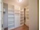 Large walk-in closet with ample shelving and drawers at 302 Spring Lakes Blvd # 302, Bradenton, FL 34210