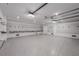 Bright and spacious garage with slatwall storage and epoxy floor at 329 Tarpon St, Anna Maria, FL 34216