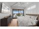 Main bedroom with water views and private balcony access at 329 Tarpon St, Anna Maria, FL 34216