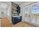 Stylish wet bar with blue cabinetry and a quartz countertop at 329 Tarpon St, Anna Maria, FL 34216