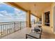 Relaxing balcony boasting stunning water views and comfortable seating at 35 Watergate Dr # 1203, Sarasota, FL 34236