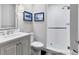 Clean bathroom with a walk-in shower, white subway tiles and updated fixtures at 35 Watergate Dr # 1203, Sarasota, FL 34236
