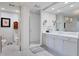 Modern bathroom with double vanity and walk-in shower at 35 Watergate Dr # 1203, Sarasota, FL 34236