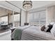 Bedroom with stunning water views and private balcony at 35 Watergate Dr # 1203, Sarasota, FL 34236