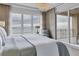 Main bedroom with water view and access to balcony at 35 Watergate Dr # 1203, Sarasota, FL 34236