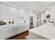 Modern kitchen with stainless steel appliances and white cabinets at 35 Watergate Dr # 1203, Sarasota, FL 34236