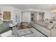 Spacious living room with large windows and city views at 35 Watergate Dr # 1203, Sarasota, FL 34236