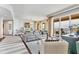 Elegant living room boasts stunning water views at 35 Watergate Dr # 1203, Sarasota, FL 34236