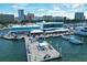 Aerial view of a marina fuel dock and modern building at 35 Watergate Dr # 1203, Sarasota, FL 34236