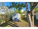 Backyard with shed and wooden fence at 3826 Rilma Ave, Sarasota, FL 34234
