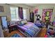 Bright bedroom featuring a double bed and large window at 3826 Rilma Ave, Sarasota, FL 34234
