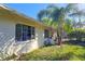 Side view of the house showcasing its brick exterior at 3826 Rilma Ave, Sarasota, FL 34234