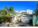 Single-story house with attached garage and landscaping at 3826 Rilma Ave, Sarasota, FL 34234