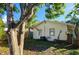 House exterior showcasing a side view and landscaping at 3826 Rilma Ave, Sarasota, FL 34234