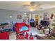 Spacious living room with red couches and a view of the kitchen at 3826 Rilma Ave, Sarasota, FL 34234