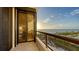 Private balcony showcasing panoramic ocean and beach views at 435 L Ambiance Dr # M408, Longboat Key, FL 34228