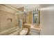 Clean bathroom with shower/tub combo and vanity at 435 L Ambiance Dr # M408, Longboat Key, FL 34228