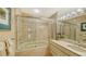 Clean bathroom with a bathtub and shower at 435 L Ambiance Dr # M408, Longboat Key, FL 34228