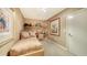 Small bedroom with built-in desk and calming decor at 435 L Ambiance Dr # M408, Longboat Key, FL 34228