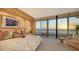 Ocean view bedroom with king-size bed and sunset view at 435 L Ambiance Dr # M408, Longboat Key, FL 34228