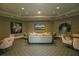 Inviting common area with comfortable seating and artwork at 435 L Ambiance Dr # M408, Longboat Key, FL 34228