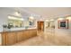 Elegant dining area with built-in cabinetry and marble flooring at 435 L Ambiance Dr # M408, Longboat Key, FL 34228