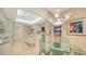 Bright kitchen with island, white cabinetry, and stainless steel appliances at 435 L Ambiance Dr # M408, Longboat Key, FL 34228