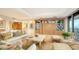 Spacious living room with built-ins, and ocean view at 435 L Ambiance Dr # M408, Longboat Key, FL 34228