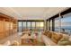 Spacious living room with ocean views and sunset at 435 L Ambiance Dr # M408, Longboat Key, FL 34228
