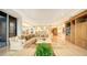 Bright living room with large windows and ocean view at 435 L Ambiance Dr # M408, Longboat Key, FL 34228