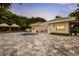 Relaxing pool area with a spa and restrooms at 435 L Ambiance Dr # M408, Longboat Key, FL 34228