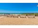 Enjoy ocean views from comfortable benches on the beach at 4430 Exeter Dr # M108, Longboat Key, FL 34228