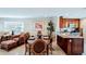 Cozy dining room complemented with wet bar, perfect for entertaining at 4430 Exeter Dr # M108, Longboat Key, FL 34228