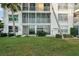 Building exterior showcasing water views at 4430 Exeter Dr # M108, Longboat Key, FL 34228