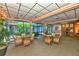 Community lobby with seating area and large windows at 4430 Exeter Dr # M108, Longboat Key, FL 34228