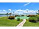 Enjoyable community putting green by the waterfront at 4430 Exeter Dr # M108, Longboat Key, FL 34228