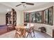 Bright breakfast nook with built-in seating and views to backyard at 4938 Hubner Cir, Sarasota, FL 34241