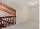 Open loft area with neutral carpeting and wood ceilings at 4938 Hubner Cir, Sarasota, FL 34241