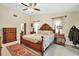 Large main bedroom with wood furnishings and ample closet space at 4938 Hubner Cir, Sarasota, FL 34241