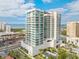 Aerial view of a modern high rise building near the water at 540 N Tamiami Trl # 1204, Sarasota, FL 34236