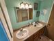 Double vanity bathroom with large mirror at 5414 Burma Ct, Bradenton, FL 34207