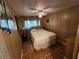 Bright bedroom with double bed and wood flooring at 5414 Burma Ct, Bradenton, FL 34207