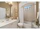 Comfortable bathroom with a bath/shower combination and custom tile work at 7223 Orchid Island Pl, Bradenton, FL 34202